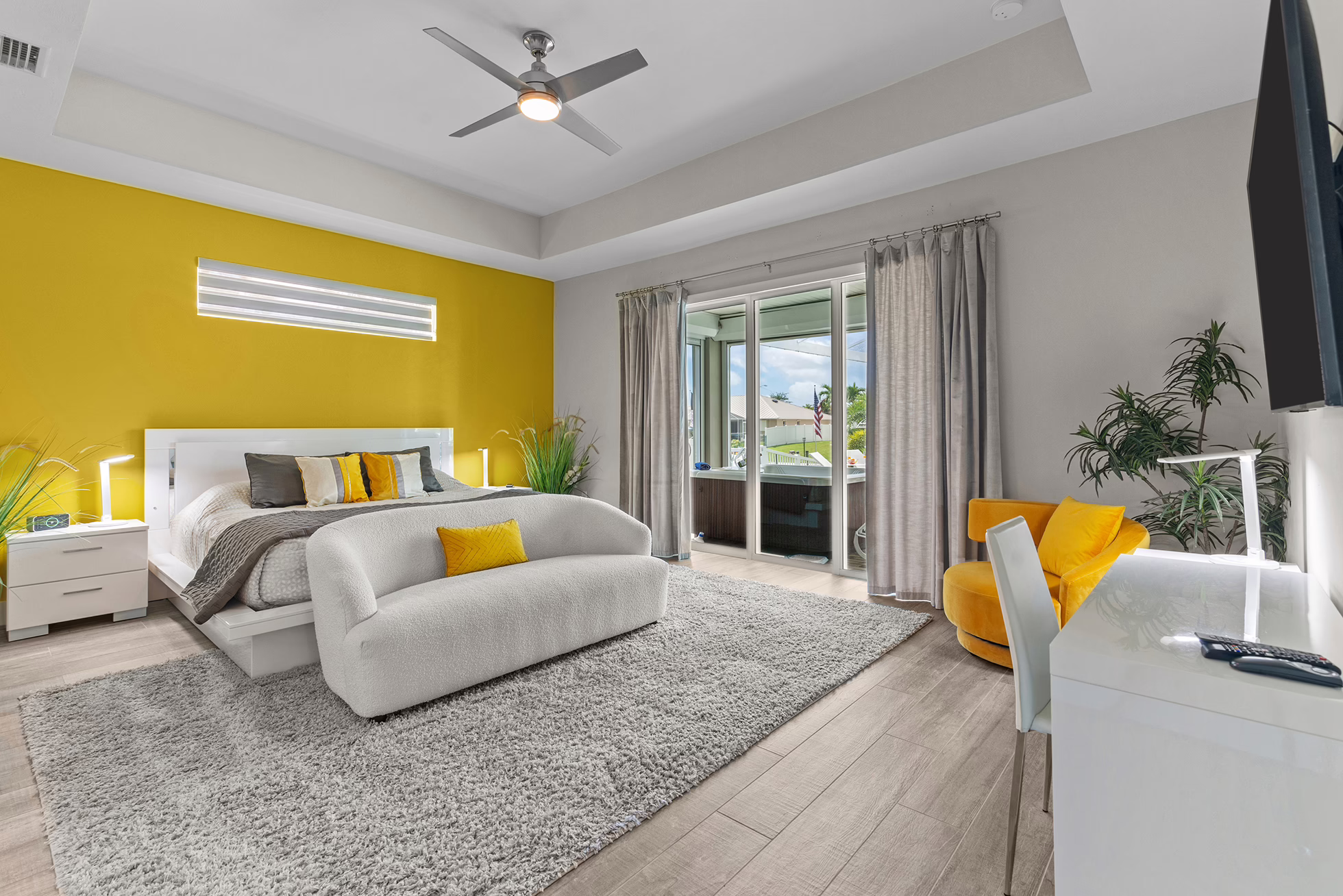 Master bedroom at Villa Dandelion with king-size bed and bright interior