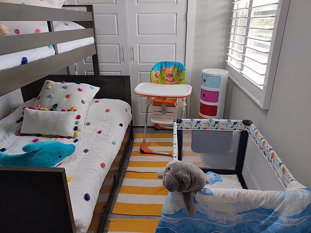 Cape Coral vacation rental kids room with twin bunk bed and ocean theme décor